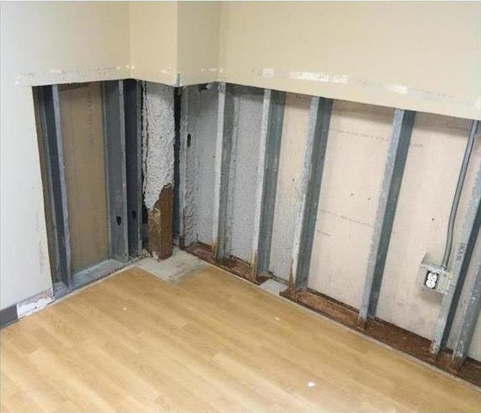 Flood cuts performed on drywall, drywall has been removed