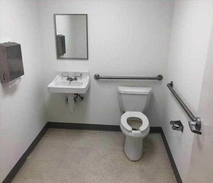 Clean commercial bathroom, clean toilet, clean sink